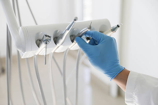 Professional Tooth Extraction technician working in Rockwall, TX